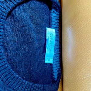 2 Calvin Klein, Merino, wool sweaters.